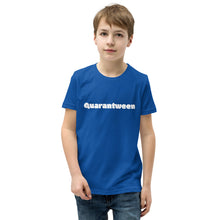 Load image into Gallery viewer, youth boy in a royal blue t-shirt with Quarantween on the front