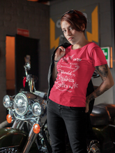Load image into Gallery viewer, woman leaning up on motorcycle wearing a red t-shirt that says Since I&#39;m not basic nor should my Christimas gift be. T-shirt also available in leaf green
