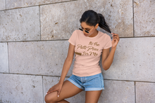 Load image into Gallery viewer, woman leaning on wall wearing heather prism peach t-shirt that says It&#39;s the Patti Pies for Me. 333 Explosion logo on left sleeve. T-shirt colors also available is heather dust
