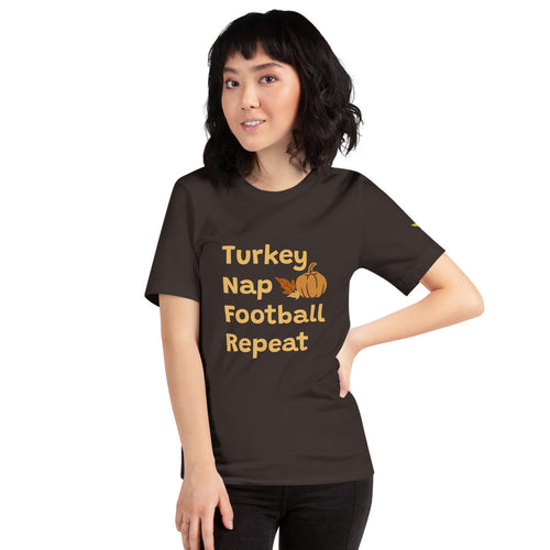 woman in a brown t-shirt with Turkey, nap, football, repeat also an image of 2 leaves and pumpkin. 333 Explosion logo on left sleeve.
