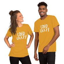 Load image into Gallery viewer, man and woman in COVID Crazy t-shirt in mustard color, t-shirt colors also available navy, red, heather forest, dark grey heather, autumn, kelly green
